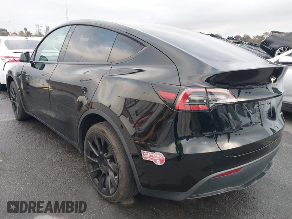 2023 Tesla Model Y Long Range with VIN 7SAYGDEE2PA024032, listed as a IAAI auction lot 41213403 with 23,418 mi miles and . Bid and sale history available at DreamBid. Image 3.