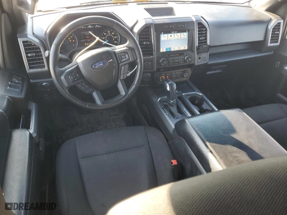 2018 Ford F-150 XL with VIN 1FTEW1EG7JFB63999, listed as a Copart auction lot 87753395 with 149,116 mi miles and Salvage Title. Bid and sale history available at carsss.com. Image 8.