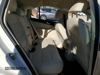 2014 Volkswagen Tiguan SE z VIN WVGAV3AX1EW523157, wystawiony jako Copart lot #82111894 z przebiegiem 103 172 mil mil oraz Szkoda całkowita • Salvage title. Historia ofert i sprzedaży dostępna na DreamBid. Obrazek 11.