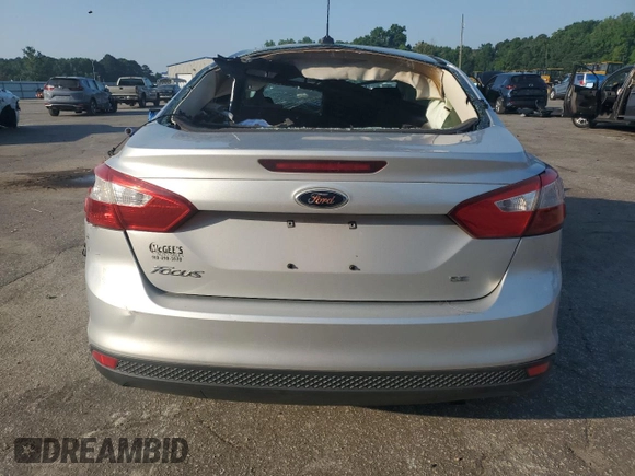 2012 Ford Focus SE with VIN 1FAHP3F20CL211460, listed as a Copart auction lot 62668645 with 151,334 mi miles and Salvage title. Bid and sale history available at DreamBid. Image 6.