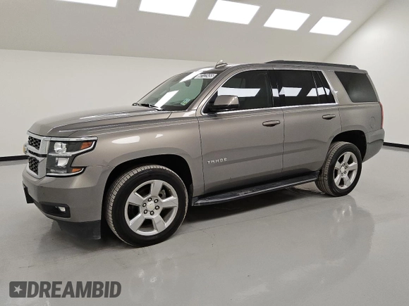 2019 Chevrolet Tahoe LT with VIN 1GNSCBKC0KR100687, listed as a Copart auction lot 53123455 with 104,006 mi miles and Clean title. Bid and sale history available at DreamBid. Image 1.