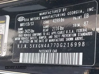 2013 Kia Optima EX with VIN 5XXGN4A77DG216998, listed as a IAAI auction lot 42102377 with 204,354 mi miles. Bid and sale history available at carsss.com. Image 9.