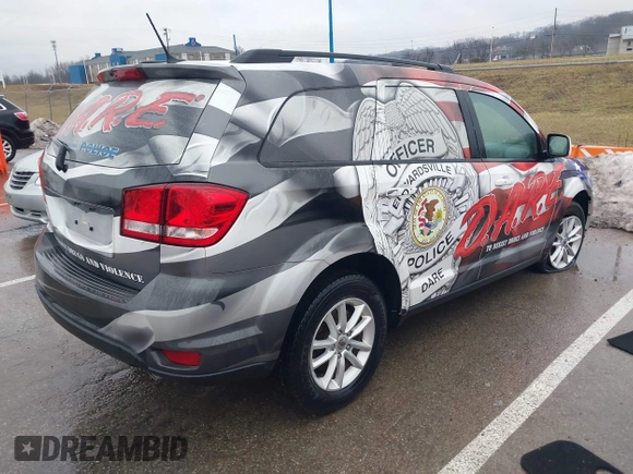 2018 Dodge Journey SXT z VIN 3C4PDCBG2JT186899, wystawiony jako IAAI lot #41465626 z przebiegiem 40 079 mil mil oraz . Historia ofert i sprzedaży dostępna na DreamBid. Obrazek 4.