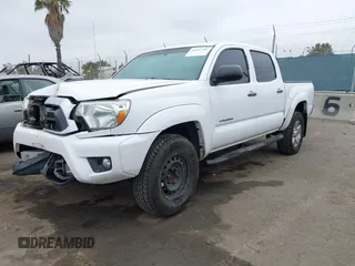2014 Toyota Tacoma PreRunner with VIN 3TMJU4GNXEM172008, listed as a IAAI auction lot 42427701 with 164,987 mi miles and . Bid and sale history available at DreamBid. Image 18.