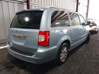 2013 Chrysler Town & Country Touring with VIN 2C4RC1BG3DR573565, listed as a IAAI auction lot 42083562 with 94,828 mi miles. Bid and sale history available at carsss.com. Image 4.