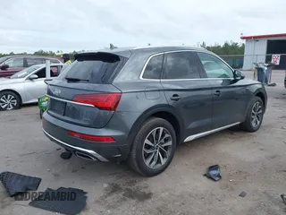 2023 Audi Q5 S line Premium Plus z VIN WA1EAAFY6P2161080, wystawiony jako IAAI lot #41282613 z przebiegiem 20 268 mil mil oraz . Historia ofert i sprzedaży dostępna na DreamBid. Obrazek 4.