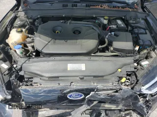 2017 Ford Fusion SE z VIN 3FA6P0H92HR150296, wystawiony jako Copart lot #57075385 z przebiegiem 135 304 mil mil oraz Szkoda całkowita • Salvage title. Historia ofert i sprzedaży dostępna na DreamBid. Obrazek 11.