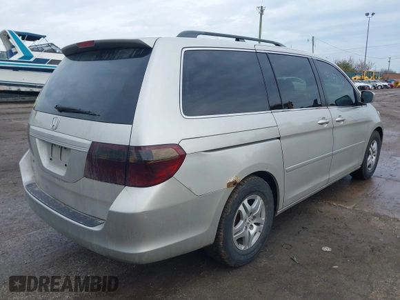 2006 Honda Odyssey EX-L z VIN 5FNRL38766B018014, wystawiony jako IAAI lot #41497144 z przebiegiem 230 225 mil mil oraz . Historia ofert i sprzedaży dostępna na DreamBid. Obrazek 4.