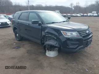 2018 Ford Police Interceptor Utility z VIN 1FM5K8AR4JGB58406, wystawiony jako IAAI lot #41721585 z przebiegiem 96 500 mil mil oraz . Historia ofert i sprzedaży dostępna na DreamBid. Obrazek 1.