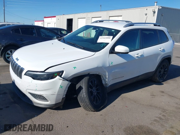 2020 Jeep Cherokee Latitude with VIN 1C4PJMCB0LD502665, listed as a IAAI auction lot 42165000 with 65,159 mi miles and . Bid and sale history available at DreamBid. Image 2.