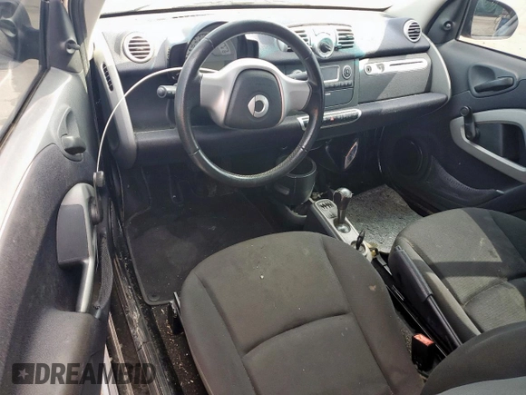 2013 Smart fortwo Pure z VIN WMEEJ3BA8DK684446, wystawiony jako Copart lot #63927965 z przebiegiem 94 604 mil mil oraz Czysty tytuł • Clean title. Historia ofert i sprzedaży dostępna na DreamBid. Obrazek 8.