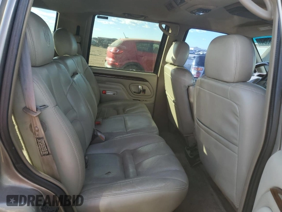 2000 Cadillac Escalade z VIN 1GYEK63R3YR218500, wystawiony jako Copart lot #77676354 z przebiegiem 164 602 mil mil oraz Czysty tytuł • Clean title. Historia ofert i sprzedaży dostępna na DreamBid. Obrazek 11.