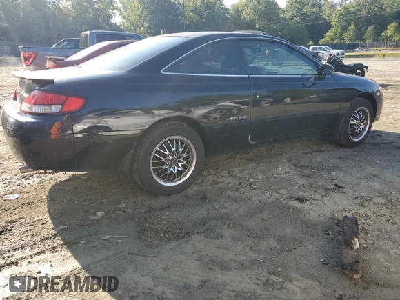 2000 Toyota Solara SE with VIN 2T1CF28P1YC327887, listed as a Copart auction lot 72334924 with 289,977 mi miles and Salvage Title. Bid and sale history available at DreamBid. Image 3.