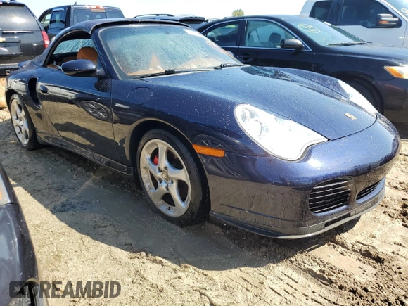 2004 Porsche 911 Carrera S with VIN WP0CB29904S675779, listed as a Copart auction lot 74008884 with Not Provided miles and Non Repairable. Bid and sale history available at DreamBid. Image 4.
