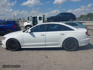 2016 Audi A6 3.0T Premium Plus with VIN WAUFGAFC9GN003664, listed as a IAAI auction lot 41890962 with 100,485 mi miles. Bid and sale history available at carsss.com. Image 14.