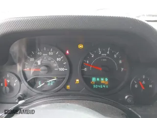 2008 Jeep Wrangler Unlimited X with VIN 1J4GA39158L529523, listed as a IAAI auction lot 41979992 with 304,641 mi miles. Bid and sale history available at carsss.com. Image 7.