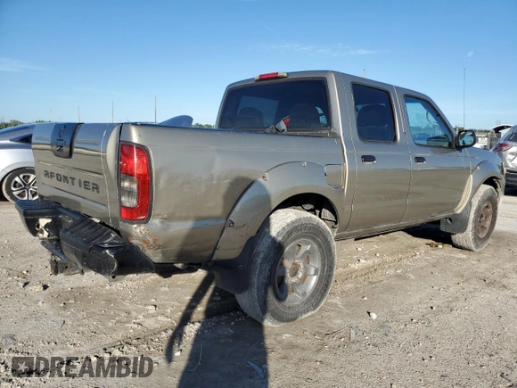 2004 Nissan Frontier XE with VIN 1N6ED27T34C400304, listed as a Copart auction lot 87015254 with 234,539 mi miles and Salvage title. Bid and sale history available at DreamBid. Image 3.