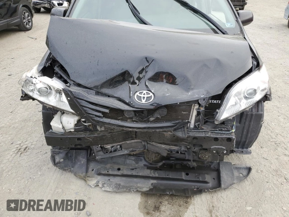 2017 Toyota Sienna L z VIN 5TDZZ3DC1HS786239, wystawiony jako Copart lot #53664265 z przebiegiem Nie podano mil oraz Szkoda całkowita • Salvage title. Historia ofert i sprzedaży dostępna na DreamBid. Obrazek 12.