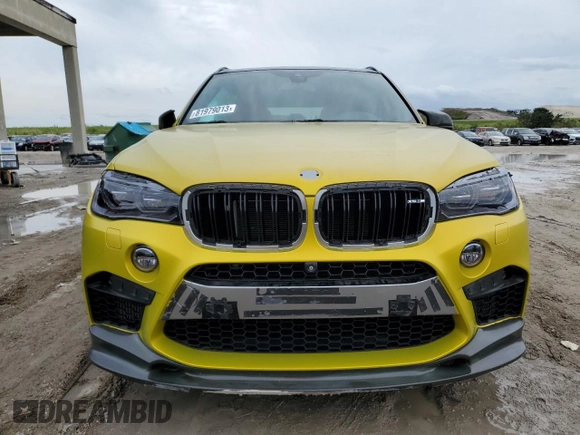 2016 BMW X5 M z VIN 5YMKT6C51G0R77692, wystawiony jako Copart lot #81979013 z przebiegiem 56 774 mil mil oraz . Historia ofert i sprzedaży dostępna na DreamBid. Obrazek 5.