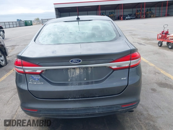 2017 Ford Fusion SE with VIN 3FA6P0H7XHR228922, listed as a IAAI auction lot 42162345 with 186,000 mi miles and . Bid and sale history available at DreamBid. Image 16.