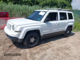 2015 Jeep Patriot Altitude with VIN 1C4NJPBA6FD285712, listed as a IAAI auction lot 42704627 with 169,043 mi miles and . Bid and sale history available at DreamBid. Image 2.