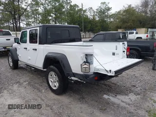 2023 Jeep Gladiator Sport S z VIN 1C6HJTAG5PL533877, wystawiony jako IAAI lot #41615284 z przebiegiem 41 191 mil mil oraz . Historia ofert i sprzedaży dostępna na DreamBid. Obrazek 3.