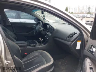 2012 Kia Optima Hybrid with VIN KNAGM4ADXC5013368, listed as a IAAI auction lot 41713297 with 131,118 mi miles. Bid and sale history available at carsss.com. Image 5.