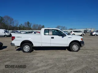 2014 Ford F-150 XL with VIN 1FTFX1EF0EKF01068, listed as a IAAI auction lot 41641910 with 212,728 mi miles. Bid and sale history available at carsss.com. Image 13.