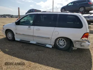 2001 Ford Windstar SEL with VIN 2FMDA56461BA55148, listed as a Copart auction lot 66531405 with 74,409 mi miles and Salvage title. Bid and sale history available at DreamBid. Image 2.