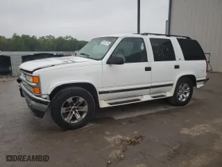 1997 Chevrolet Tahoe with VIN 1GNEK13R2VJ339111, listed as a Copart auction lot 48187215 with 166,260 mi miles and Salvage Title. Bid and sale history available at carsss.com. Image 1.
