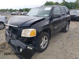 2004 GMC Envoy SLT z VIN 1GKDT13S142113238, wystawiony jako IAAI lot #42232827 z przebiegiem 185 136 mil mil oraz . Historia ofert i sprzedaży dostępna na DreamBid. Obrazek 2.
