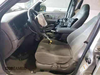 2001 Mazda Tribute LX with VIN 4F2CU08141KM65160, listed as a Copart auction lot 60895624 with 255,194 mi miles and Salvage Title. Bid and sale history available at carsss.com. Image 7.