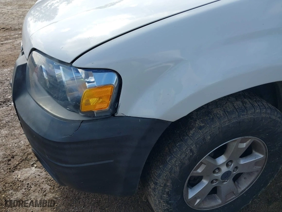 2006 Ford Escape XLT with VIN 1FMYU03176KC35659, listed as a IAAI auction lot 41434315 with 133,746 mi miles. Bid and sale history available at carsss.com. Image 12.