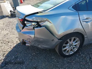 2016 Mazda 6 i Sport with VIN JM1GJ1U50G1412026, listed as a IAAI auction lot 41820838 with 130,262 mi miles and . Bid and sale history available at DreamBid. Image 6.