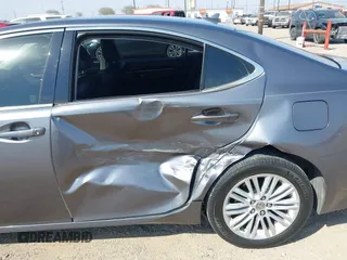 2013 Lexus ES 4dr Sdn with VIN JTHBK1GG8D2051976, listed as a IAAI auction lot 41804952 with 153,825 mi miles. Bid and sale history available at carsss.com. Image 6.