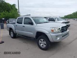 2007 Toyota Tacoma PreRunner z VIN 3TMJU62N77M035999, wystawiony jako IAAI lot #42143811 z przebiegiem 252 946 mil mil oraz . Historia ofert i sprzedaży dostępna na DreamBid. Obrazek 1.
