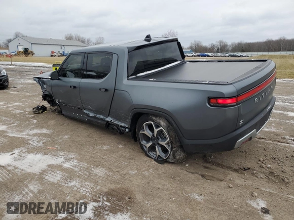 2024 Rivian R1T Adventure with VIN 7FCTGBAA8RN034399, listed as a Copart auction lot 86857044 with 8,176 mi miles and Salvage Title. Bid and sale history available at carsss.com. Image 2.