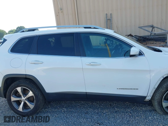 2020 Jeep Cherokee Limited with VIN 1C4PJMDXXLD612052, listed as a IAAI auction lot 42582343 with 96,072 mi miles and . Bid and sale history available at DreamBid. Image 13.