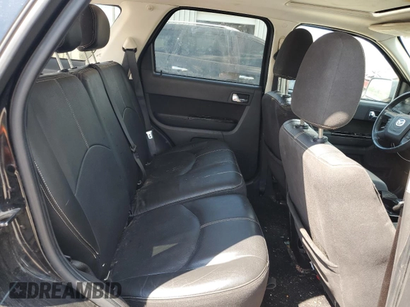2010 Mazda Tribute Grand Touring with VIN 4F2CY0C78AKM03177, listed as a Copart auction lot 66729164 with 75,400 mi miles and Salvage Title. Bid and sale history available at carsss.com. Image 11.