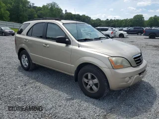 2007 Kia Sorento LX with VIN KNDJD736X75717813, listed as a Copart auction lot 56456025 with 145,722 mi miles and Salvage title. Bid and sale history available at DreamBid. Image 4.