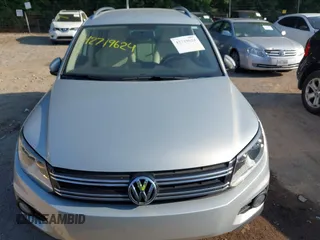 2012 Volkswagen Tiguan SE with VIN WVGBV7AX7CW580259, listed as a IAAI auction lot 42719624 with 94,710 mi miles and . Bid and sale history available at DreamBid. Image 6.