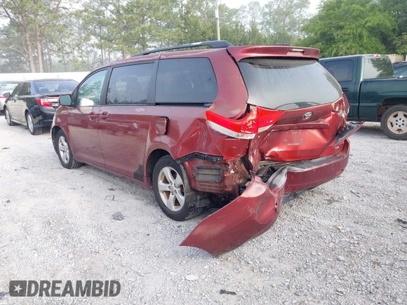 2013 Toyota Sienna LE AAS with VIN 5TDKK3DC1DS368585, listed as a IAAI auction lot 42070311 with 181,408 mi miles. Bid and sale history available at carsss.com. Image 3.