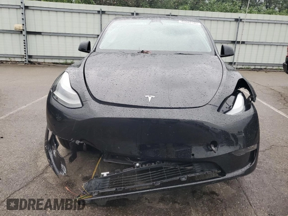 2022 Tesla Model Y Performance с VIN 7SAYGDEF5NF554018, выставлен на аукционе Copart как лот 65062185 с пробегом Не указан миль и Списание • Salvage title. История ставок и продаж доступна на DreamBid. Изображение 5.