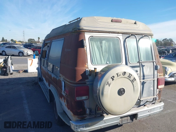 1989 GMC Vandura z VIN 1GDEG25K1K7521984, wystawiony jako IAAI lot #41371811 z przebiegiem 43 502 mil mil oraz . Historia ofert i sprzedaży dostępna na DreamBid. Obrazek 3.