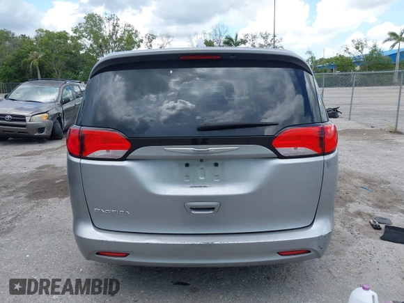 2017 Chrysler Pacifica Touring with VIN 2C4RC1DG7HR516711, listed as a IAAI auction lot 42633544 with 97,853 mi miles and . Bid and sale history available at DreamBid. Image 6.