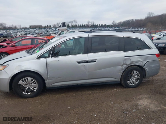 2014 Honda Odyssey LX with VIN 5FNRL5H22EB026657, listed as a IAAI auction lot 41114634 with 132,125 mi miles. Bid and sale history available at carsss.com. Image 6.
