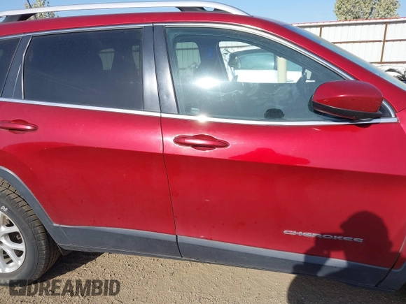 2016 Jeep Cherokee Latitude with VIN 1C4PJMCS8GW250318, listed as a IAAI auction lot 42126241 with 105,028 mi miles. Bid and sale history available at carsss.com. Image 14.