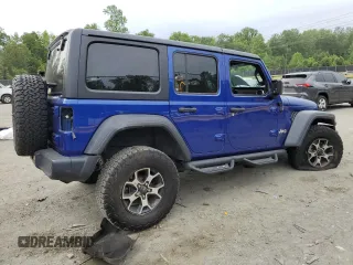 2019 Jeep Wrangler Unlimited Sport S with VIN 1C4HJXDG3KW556884, listed as a Copart auction lot 58174795 with Not provided miles and Salvage title. Bid and sale history available at DreamBid. Image 3.
