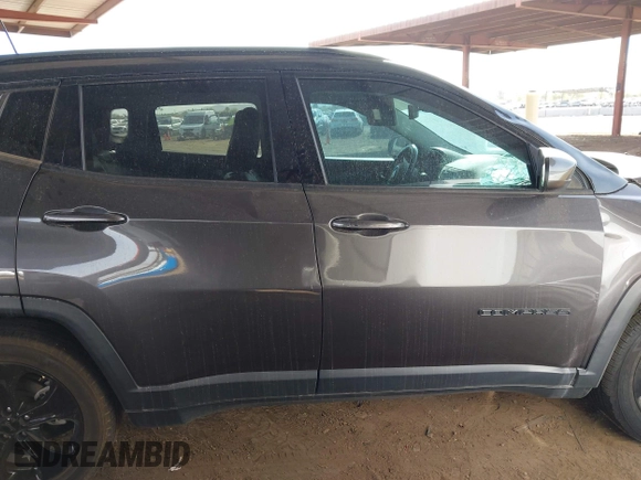2021 Jeep Compass Altitude with VIN 3C4NJCBB9MT560370, listed as a IAAI auction lot 41583996 with 75,955 mi miles and . Bid and sale history available at DreamBid. Image 13.