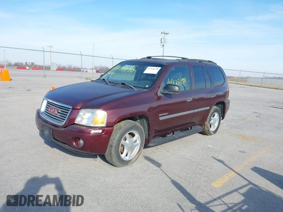 2006 GMC Envoy SLE z VIN 1GKDT13S762328884, wystawiony jako IAAI lot #41778198 z przebiegiem Nie podano mil oraz . Historia ofert i sprzedaży dostępna na DreamBid. Obrazek 2.